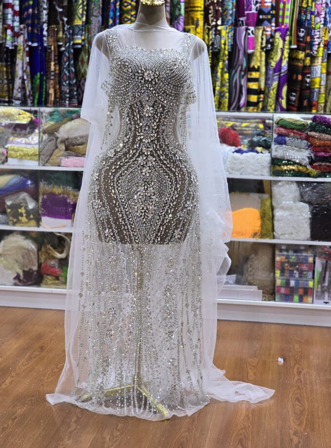 Fully hand beaded luxury panel fabric.